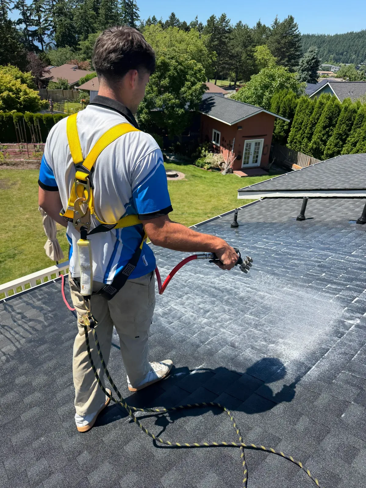 Drone shot of roof cleaning in progress